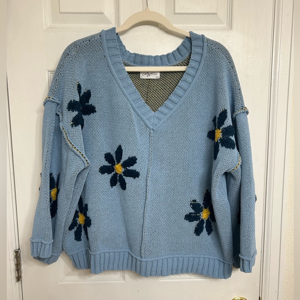 Carly Jean Los Angeles Blue V-Neck Sweater with Floral Design